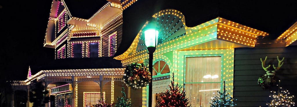 House full of Christmas Lights outside.